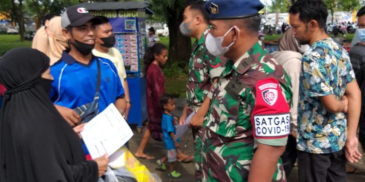 Hujan Guyur Kota Makassar Tidak Mengurung Tim Vaksinator Bekerja